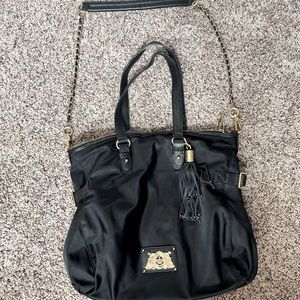 Juicy Couture black handbag with crossbody strap, royal blue interior pocket